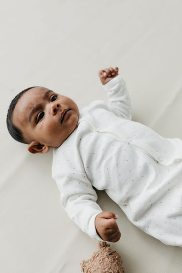 Organic Cotton Onepiece - Tiny Dot on Latte - White brown dotted button up baby onesie from Jamie Kay