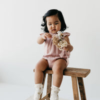 Organic Cotton Muslin Tamara Playsuit - Mauve Shadow - Pink baby girls short sleeved playsuit from Jamie Kay